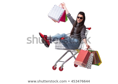 Cheerful Young Woman After Shopping Isolated On White [[stock_photo]] © Elnur