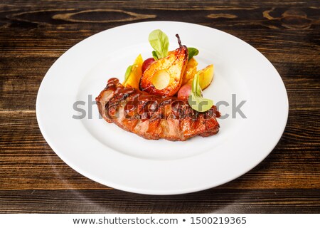 Stock fotó: Fresh Roasted Pork Steaks On White Plate