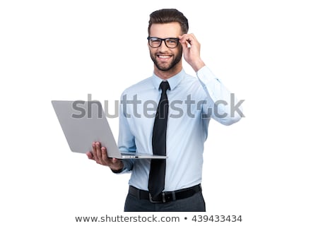 ストックフォト: Confident Businessman Working On Laptop Isolated On A White Background