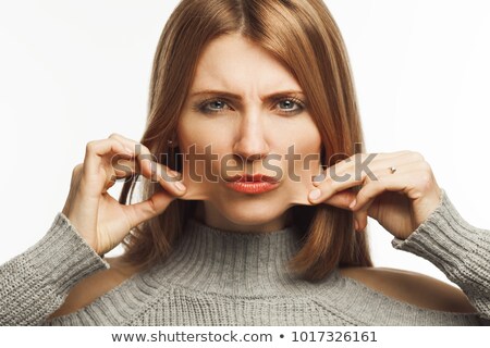 Beautiful Young Fashion Woman Pulling Her Hair Stock photo © Augustino