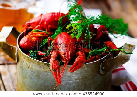 Сток-фото: Bowl Of Boiled Crayfish On The Wooden Table