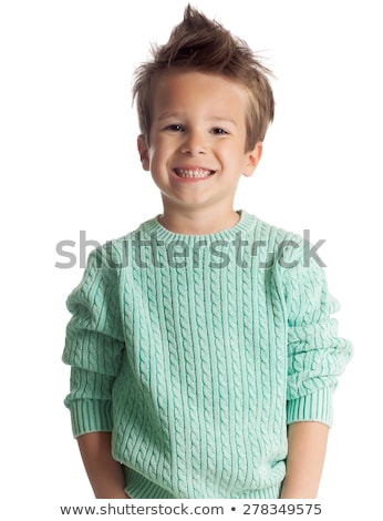 Foto d'archivio: A Four Year Old Boy Posing Over White Studio Background