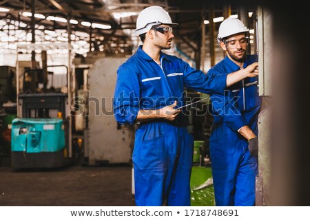 ストックフォト: Warehouse Worker Using Digital Tablet