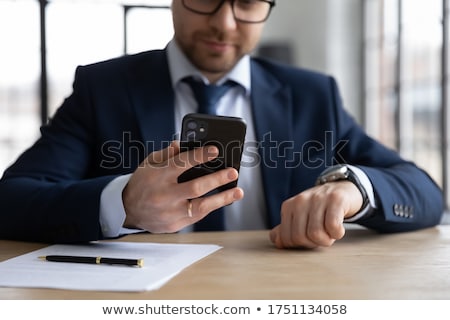 ストックフォト: Businessman Checking The Time