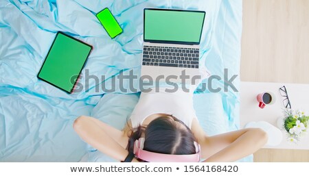 Stock photo: Happy Asian Woman With Tablet Pc And Earphones