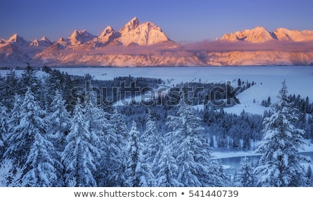 Foto stock: Hole To The Winter Snowy Landscape