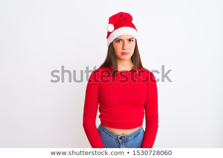 Stock photo: Beautiful Woman Wearing Santas Hat Looking Angry