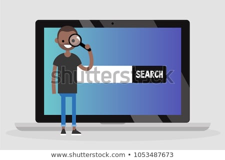 Foto stock: Person With Magnifier Through Laptop