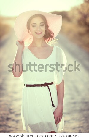 Foto stock: Brunette Wearing Brown Dress