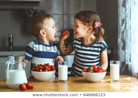 [[stock_photo]]: Eating Strawberry