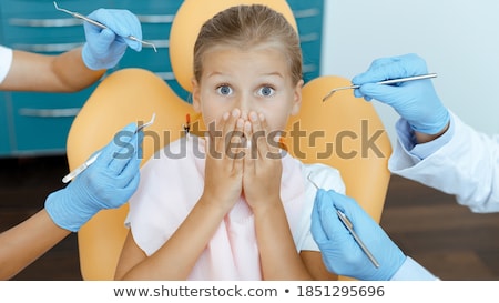 Stock fotó: Girl Is Afraid Of The Dentist