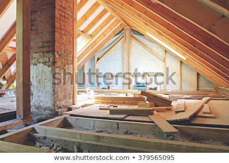 Foto stock: House Attic Under Construction Mansard Wall Insulation