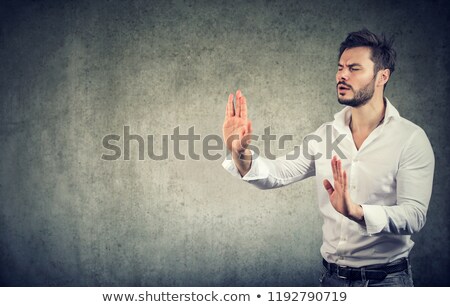 Stockfoto: Blindfolded Business Man Outstretching Hands And Searching In Darkness