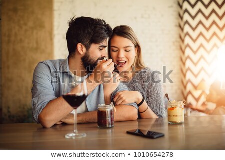 Stock fotó: Man Feeding Hisr Girlfriend