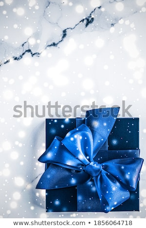 Stockfoto: Blue Silk Ribbon And Bow On Luxury Marble Background Holiday Fl