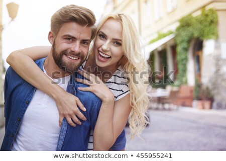 Stock photo: Young Woman Embraces Man Behind