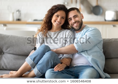 Foto d'archivio: Relaxed Young Casual Couple Posing