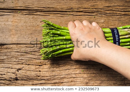 Stockfoto: Old Hand Hodling An Old Wooden Spear