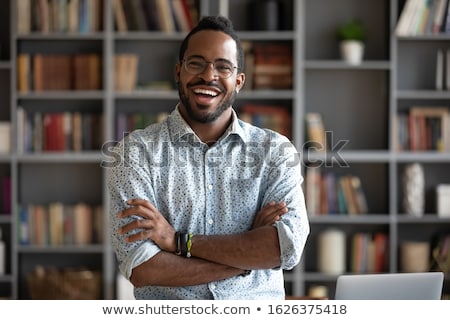 Stockfoto: African Handsome Businessman Standing In Library