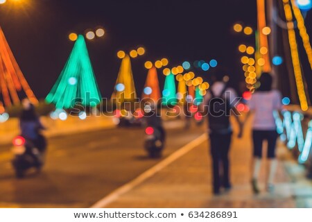 Foto stock: Woman Riding Scooter At Night In Vietnam Asia