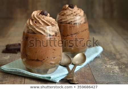 Foto stock: Two Eggs With Milk Chocolate And Black