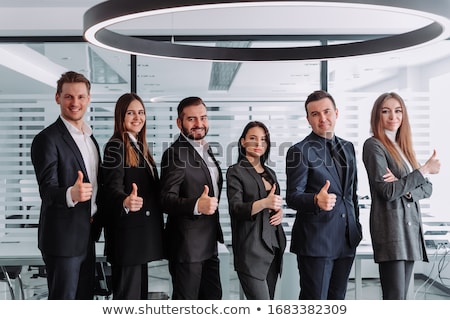 ストックフォト: Smiling Asian Businesswoman Showing Thumbs Up