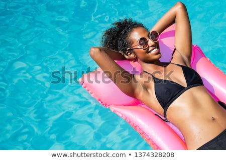 Stock photo: Happy Young Woman In Pink Bikini Swimsuit