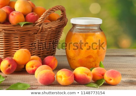 Stok fotoğraf: Half Apricot And Glass Of Juice