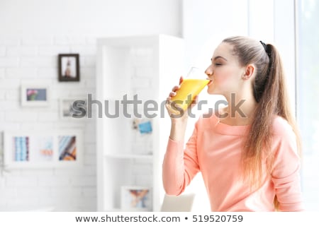 Stockfoto: Woman Drinking Juice