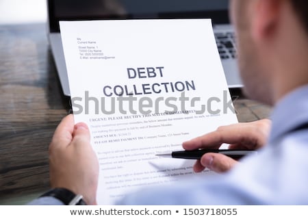 Foto d'archivio: Man Reading Debt Collection Letter