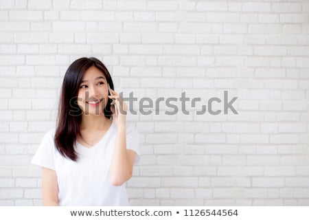 Stockfoto: Asian Woman Talking On Smart Phone