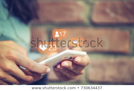 Stock photo: Hand Using Smartphone With Social Media Concept