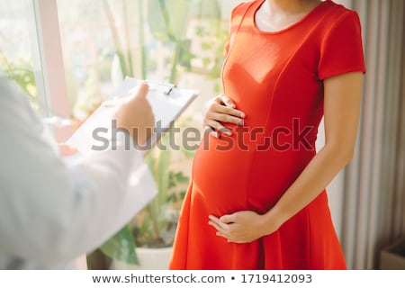 Stockfoto: A Pregnant Woman At Her Gynaecologist