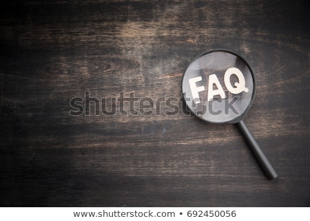 Foto stock: Faq Word And Magnifying Glass