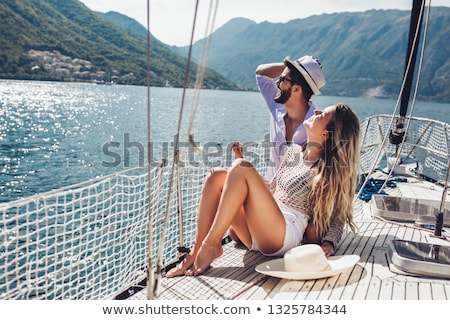 Сток-фото: Couple Relaxing On Boat Sailing