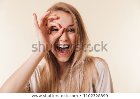 Stok fotoğraf: Image Of Amusing Woman 20s Wearing Casual Clothing Laughing Sta