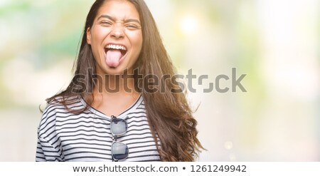 Foto stock: Woman Showing Tongue