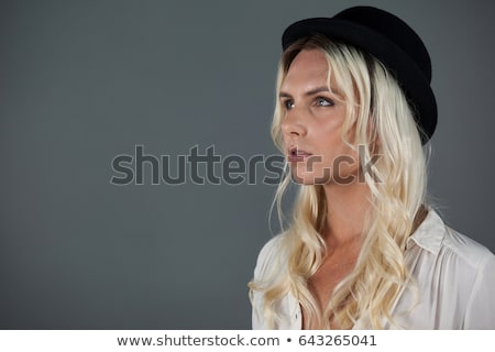 Foto d'archivio: Transgender Woman Wearing Hat Looking Away