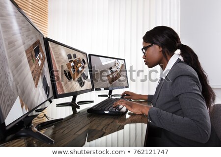 Stock photo: Businesswoman Checking Cctv Camera Footage