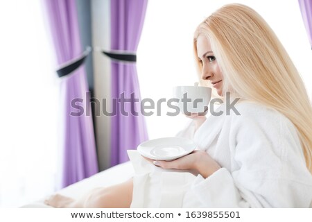 Stock photo: Beautiful Woman Drinking Cappuccino Coffee Looking To Side