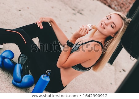 Foto stock: Blond Woman Eating Cereals