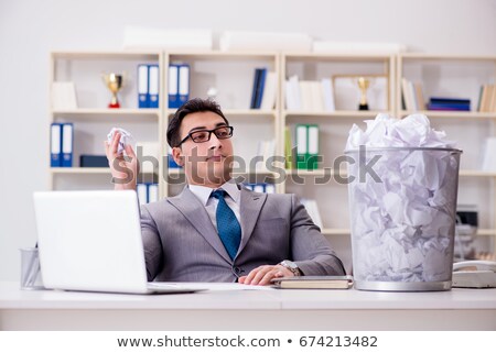 Man Throw Crumpled Paper In Trash Can Stock photo © Elnur