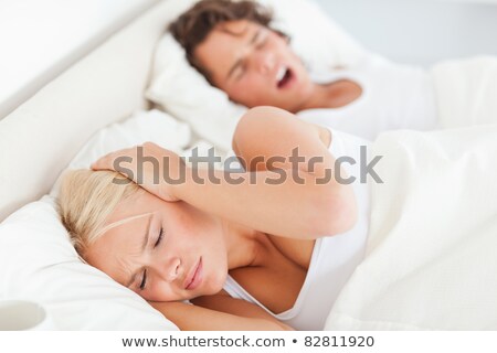 [[stock_photo]]: Woman Awaken By Her Boyfriends Snoring In Their Living Room