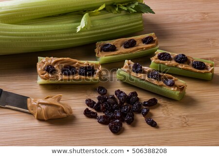 Foto stock: Celery Peanut Butter And Raisins