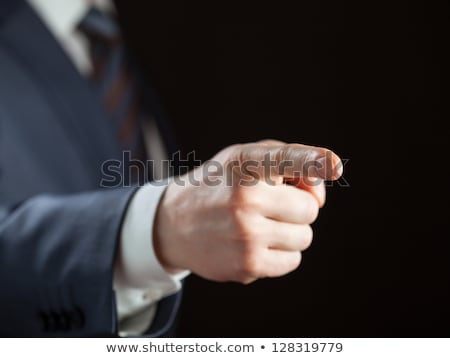 Foto stock: Aggressive Businessman Pointing Finger