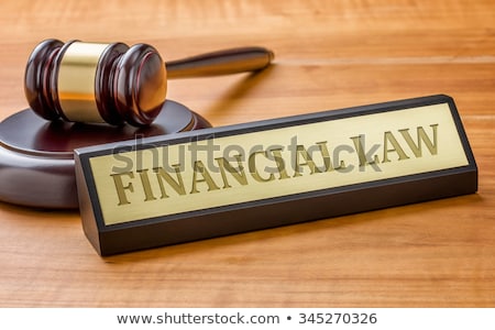 Foto stock: A Gavel And A Name Plate With The Engraving Financial Law