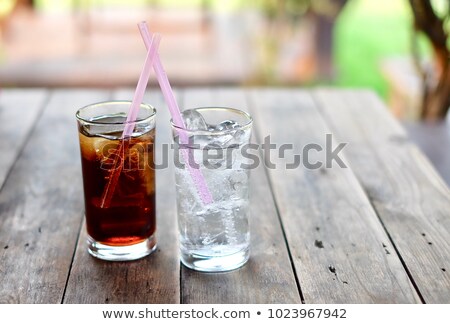 ストックフォト: Double Glasses Of Cold Water On Wooden Table