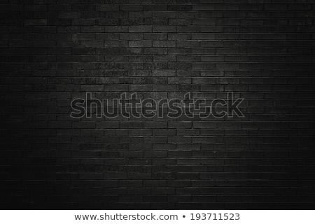 Foto stock: Black Brick Wall And Concret Floor