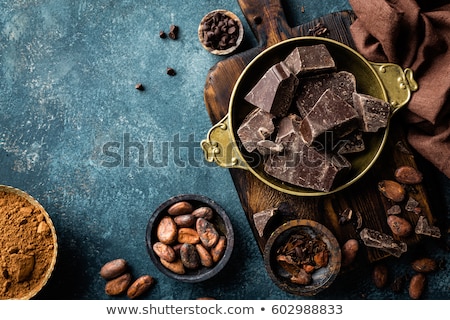 Stock foto: Dark Chocolate Pieces Crushed And Cocoa Beans Culinary Background Directly Above