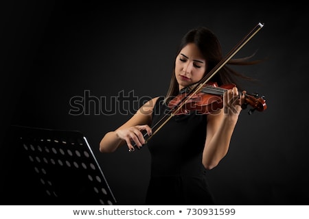 Stok fotoğraf: Violin Player In Orchestra